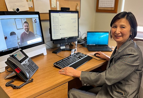Dr. Mi-Hyon Cho, a specialist in brain injury medicine at the VA Hudson Valley Healthcare System, connects virtually with her team. 